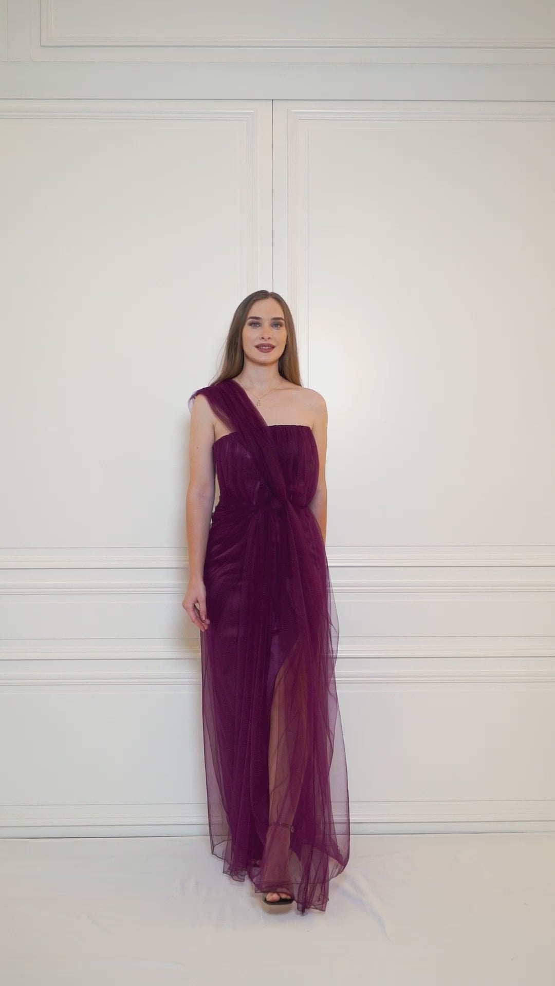 Adjustable-strap royal purple gown, featuring a slit for those majestic moments.