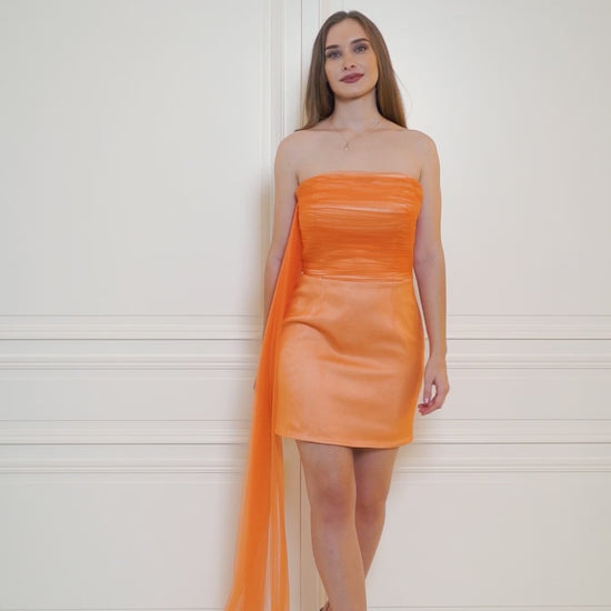 Mini strapless dress in apricot crush that steals the spotlight, adding a pop of color to your next occasion.