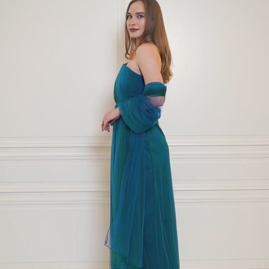 One-shoulder turquoise gradient dress, featuring a slit for added allure and crafted to perfection.